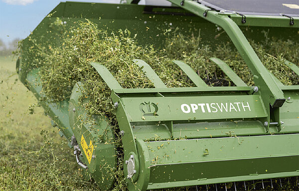 Optimal speed control for a constant crop feed rate