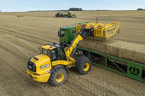 Depositing the bales to needs